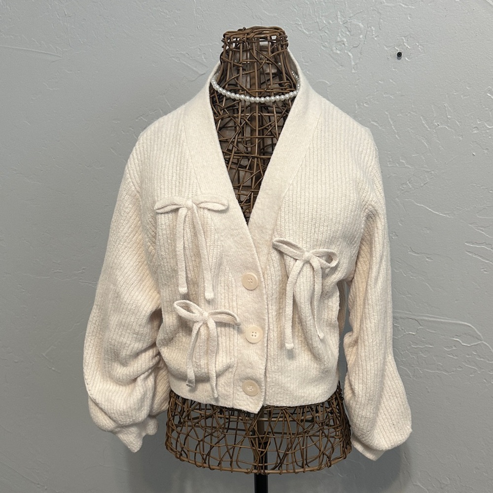Du Fond Du Coeur Cozy Cream Cardigan Sweater with button front and bows. OS
